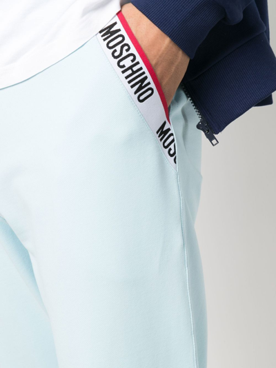 Shop Moschino Logo-print Trim Track Pants In Blau
