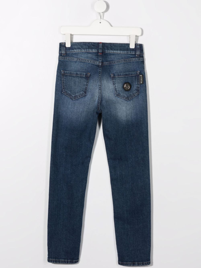 Shop Philipp Plein Junior Logo-patch Slim-cut Jeans In Blue