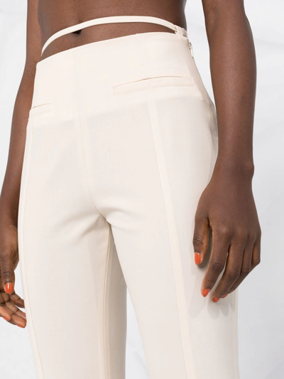 Shop Jacquemus Wool-blend Flared Trousers In Neutrals