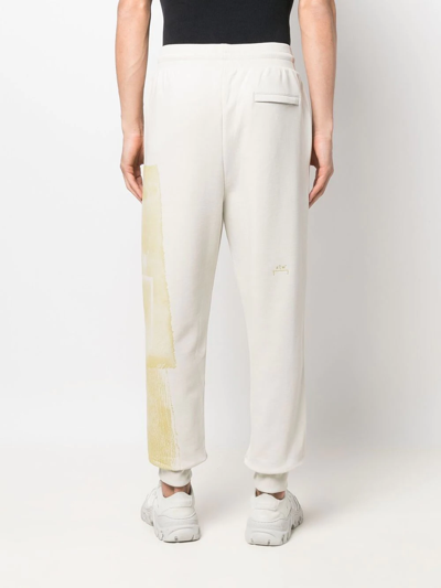 Shop A-cold-wall* Graphic-print Cotton Joggers In Neutrals