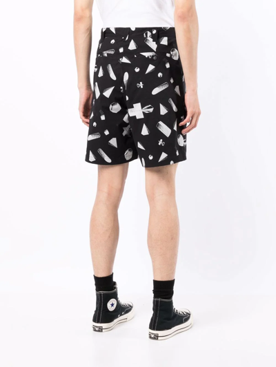 Shop Undercover Abstract Geometric Print Shorts In Schwarz