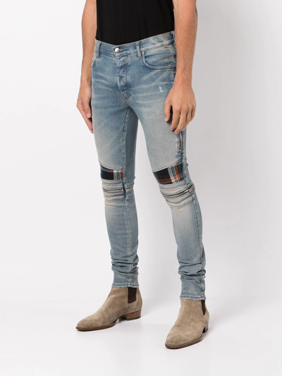 Shop Amiri Mid-rise Contrasting-panel Skinny Jeans In Orange
