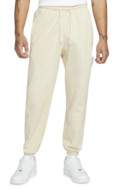 Shop Nike Dri-fit Standard Issue Joggers In Sesame/ Heather/ Pale Ivory