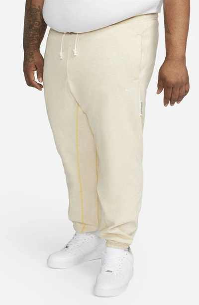 Shop Nike Dri-fit Standard Issue Joggers In Sesame/ Heather/ Pale Ivory