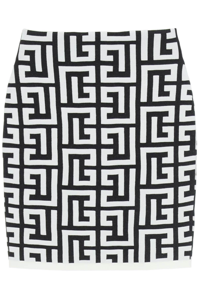 Shop Balmain Monogram Knit Mini Skirt In White,black