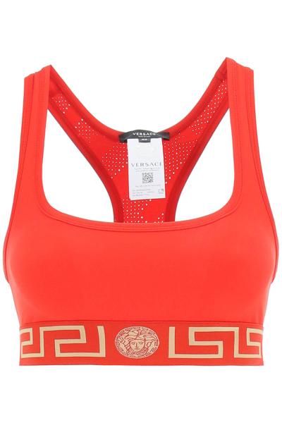 Shop Versace Sports Bra With Greca Border In Red,gold