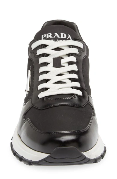 Shop Prada Prax 01 Low Top Sneaker In Nero