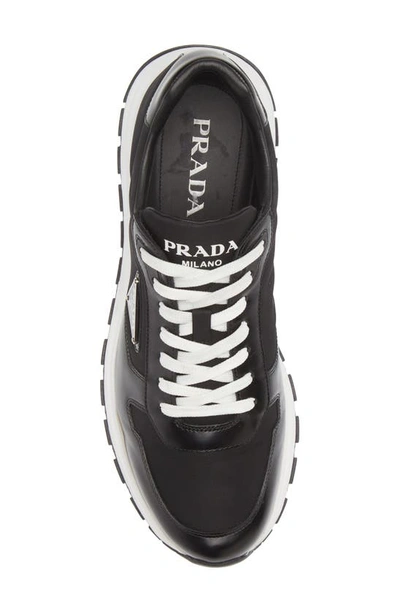 Shop Prada Prax 01 Low Top Sneaker In Nero