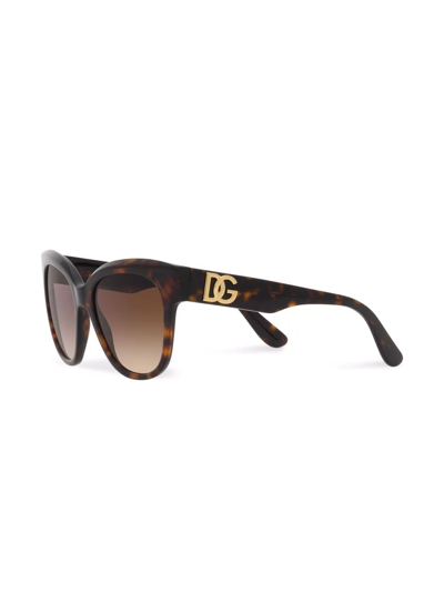 Shop Dolce & Gabbana Dg Crossed Sunglasses In Brown