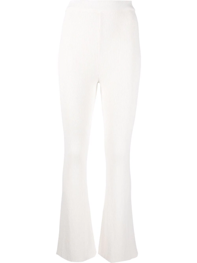 Shop Aeron Ribbed-knit Flared Trousers In White