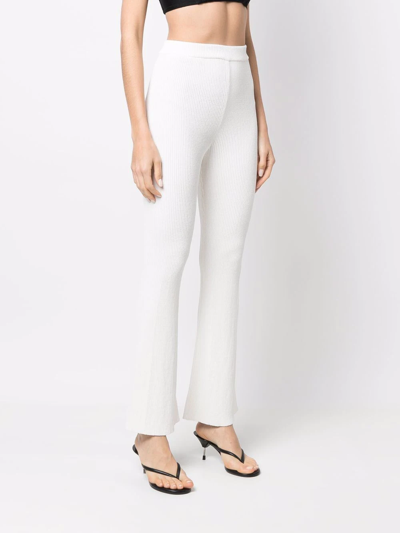 Shop Aeron Ribbed-knit Flared Trousers In White