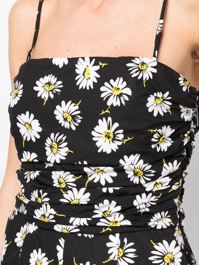 Shop Msgm Floral-print Cotton Jumpsuit In Schwarz