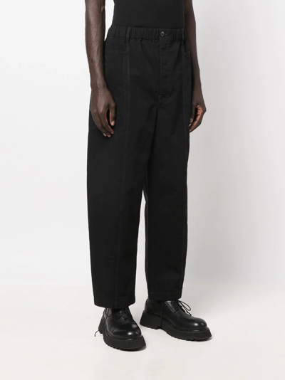 Shop Lemaire Mid-rise Wide-leg Trousers In Schwarz