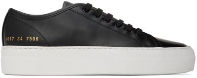 Shop Common Projects Black Tournament Low Super Sneakers In 7506 Black/white