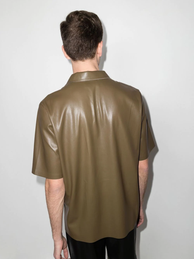 Shop Nanushka Short-sleeved Faux Leather Shirt In Grün