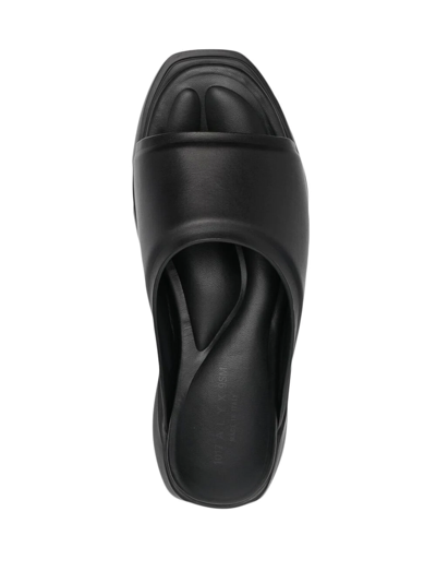Alyx Mono Leather Slide Sandals In Schwarz