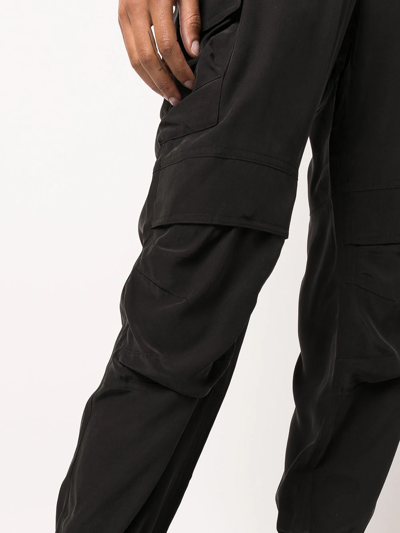 Shop John Elliott Tapered-leg Cropped Silk Trousers In Schwarz