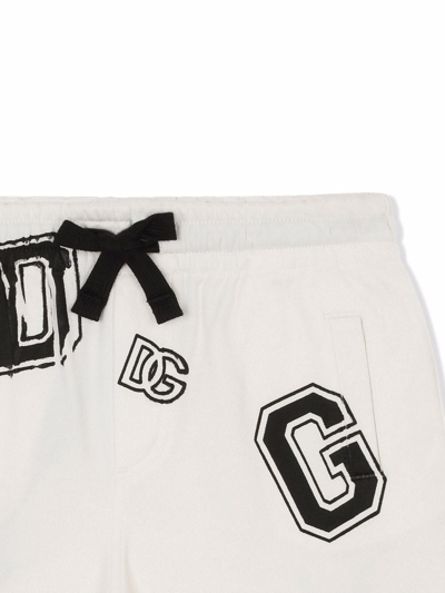 Shop Dolce & Gabbana Logo Lettering-print Cotton Track Shorts In White