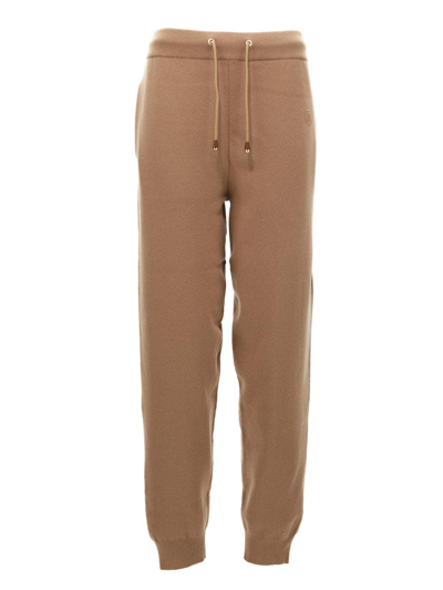 Shop Burberry Trousers Woman In Beige