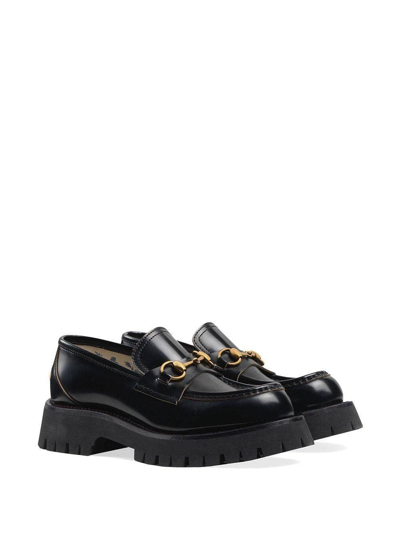 Shop Gucci Black And Gold Lug Sole Horsebit Loafers