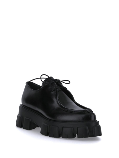 Shop Prada Monolith Lace-up Shoes In Black