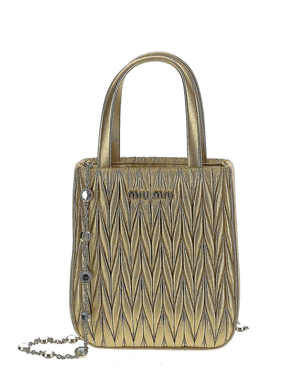 Miu miu gold bag hotsell