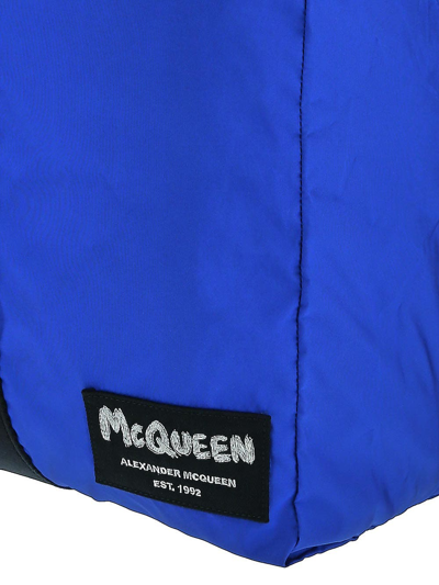 Shop Alexander Mcqueen Logo Graffiti Duffle Bag In Blue