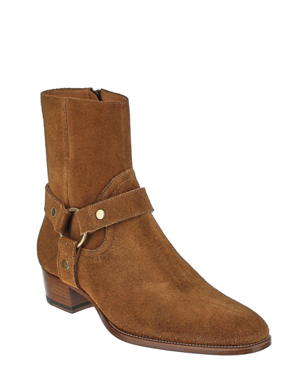 Shop Saint Laurent Wyatt Harness Ankle Boots In Brown