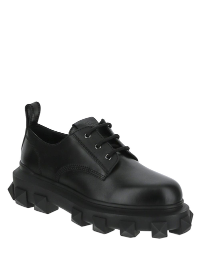 Shop Valentino Trackstud Calfskin Derby In Black