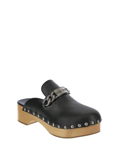 Shop Miu Miu Black Clogs