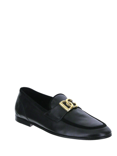Shop Dolce & Gabbana Interlocking Dg Plaque Loafers In Black