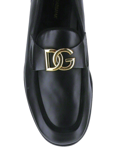 Shop Dolce & Gabbana Interlocking Dg Plaque Loafers In Black