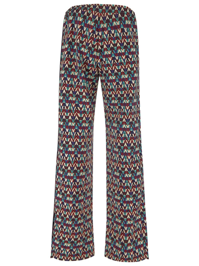 Shop Valentino Optical Print Trousers In Multicolor