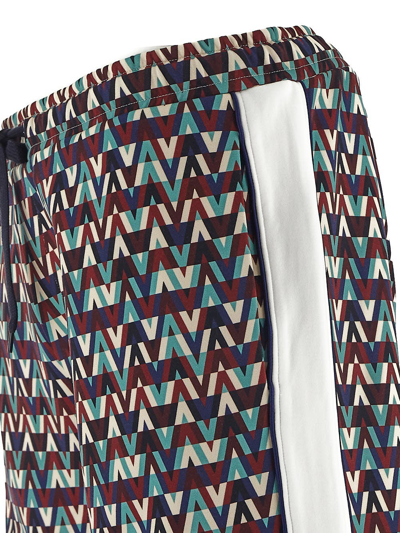 Shop Valentino Optical Print Trousers In Multicolor