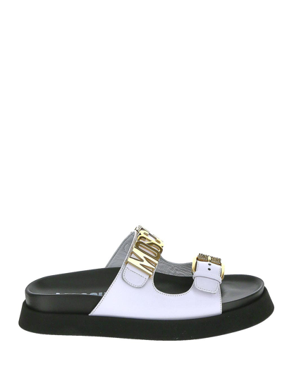 Shop Moschino Logo Plaque Flat Sandals In White