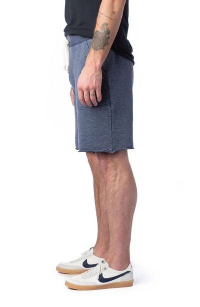 Shop Alternative Victory Washed French Terry Cutoff Shorts In Dark Navy