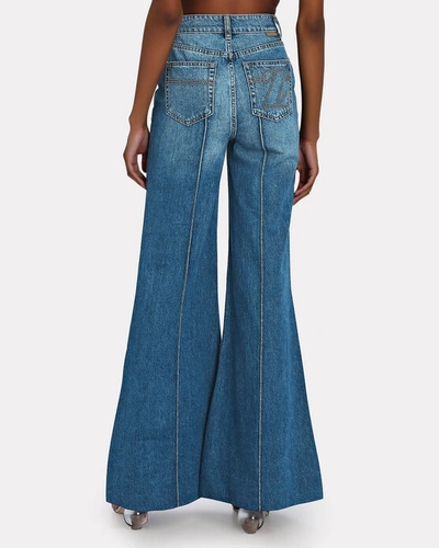 Shop Zimmermann Rhythmic Satin-trimmed Super Flared Jeans In Blue-med