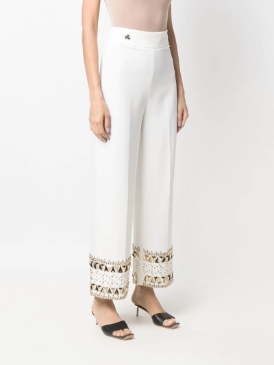 Shop Philipp Plein Cady Gold-studded Trousers In White