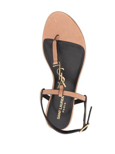 Shop Saint Laurent Cassandra Flat Sandals In Brown
