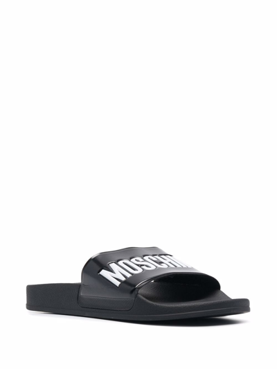 Shop Moschino Sandals Black