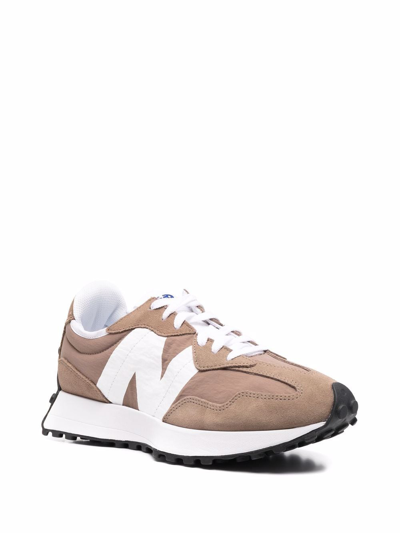 Shop New Balance Sneakers Brown