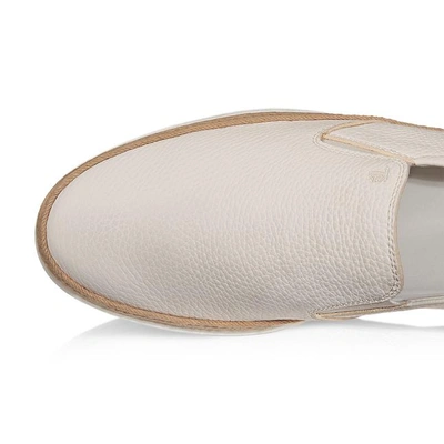 Shop Tod's Leather Slip-ons In White