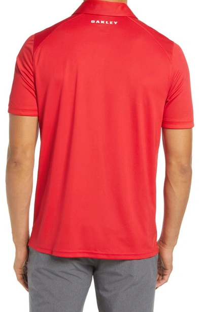 Shop Oakley Divisional 2.0 Performance Golf Polo In Team Red