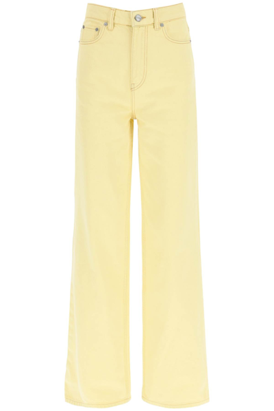 Shop Ganni Magny Jeans In Yellow