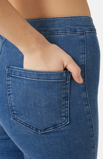 Shop Topshop Moto 'joni' High Rise Super Skinny Jeans In Mid Denim