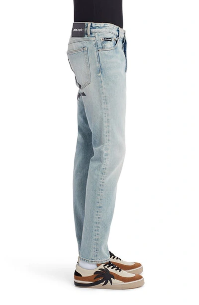 Shop Palm Angels Back Logo Jeans In Light Blue White