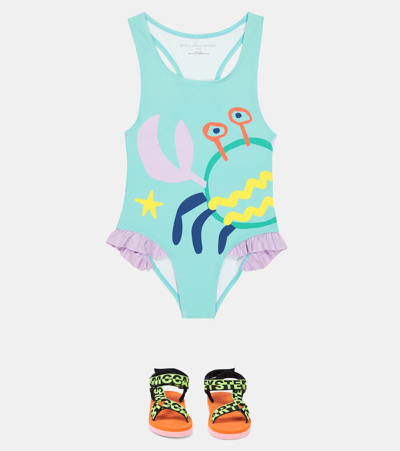 Shop Stella Mccartney Ruffle Trimmed Printed Swimsuit In Celeste/multicolor