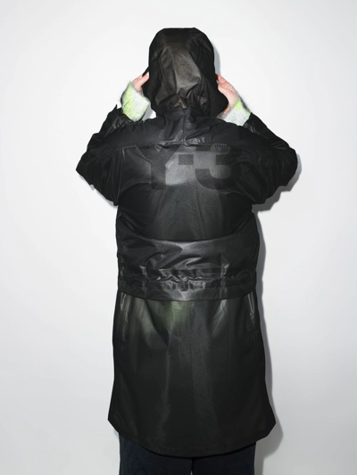 Shop Y-3 Hooded Midi Raincoat In Schwarz