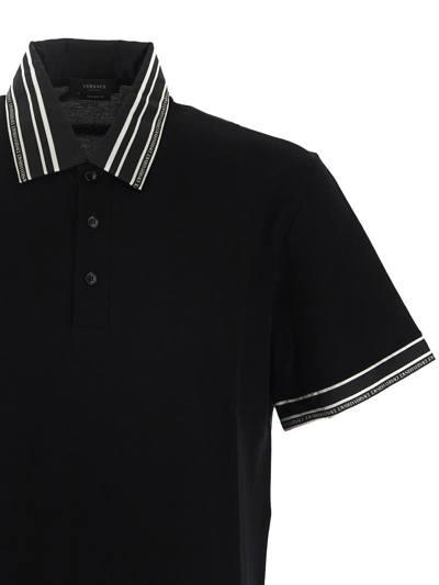 Shop Versace Logo Collar Polo Shirt In Black