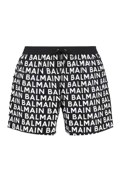 Shop Balmain Printed Swim Shorts In Black